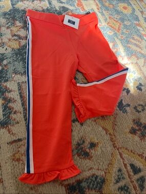 New Janie and Jack gorgeous Girls Orange Ruffle Hem Leggings with Side Stripe